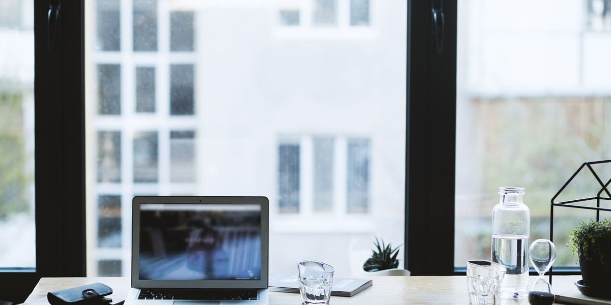 Laptop on a clean office desk in a work from home setting